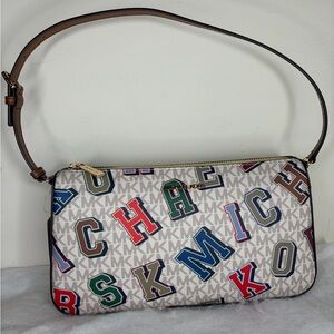 Michael Kors Jet Set LG Pouchette Shoulder Bag NWT Varsity Letter Vanilla Logo